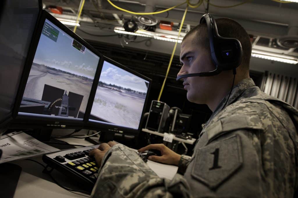 Photo of soldier looking at computer screen illustrates blog "What Is Controlled Unclassified Information (CUI), exactly? "
