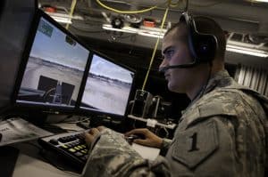 Photo of soldier looking at computer screen illustrates blog "What Is Controlled Unclassified Information (CUI), exactly? "