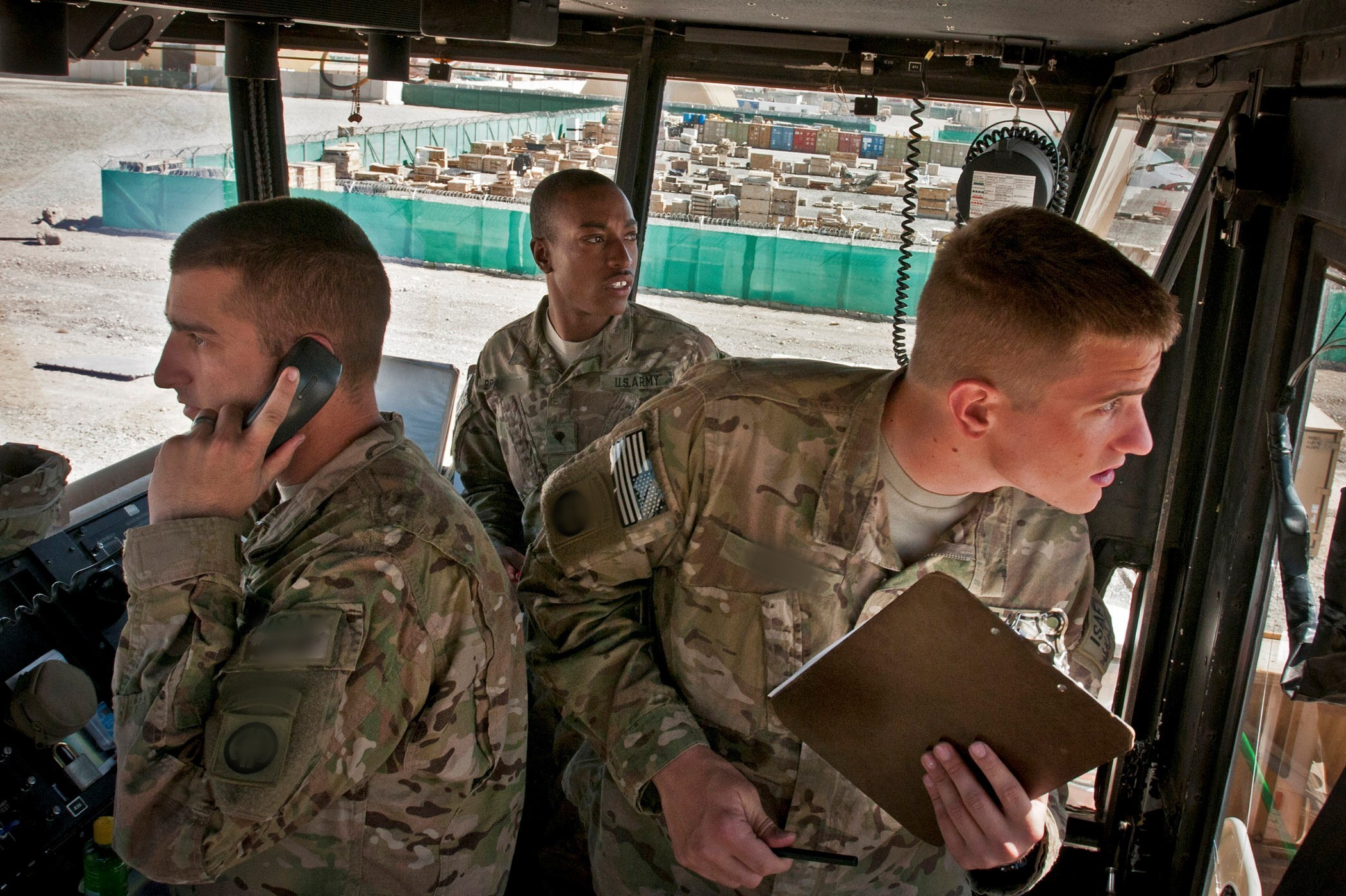 Three soldiers, one holding clipboard and another holding phone receiver illustrate blog "Is ITAR Data CUI?"