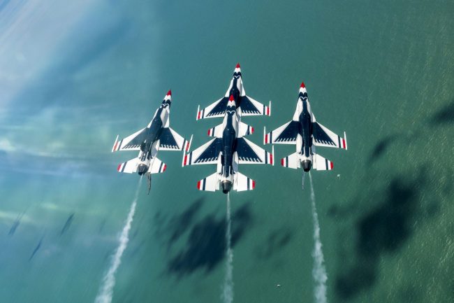 Thunderbirds perform at Cocoa Beach Three Thunderbird military planes painted red, white, and blue illustrate blog "ITAR: Who Is a U.S. Person?"